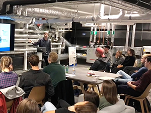 Basement of KTH Live-In Lab with students listening to lecture