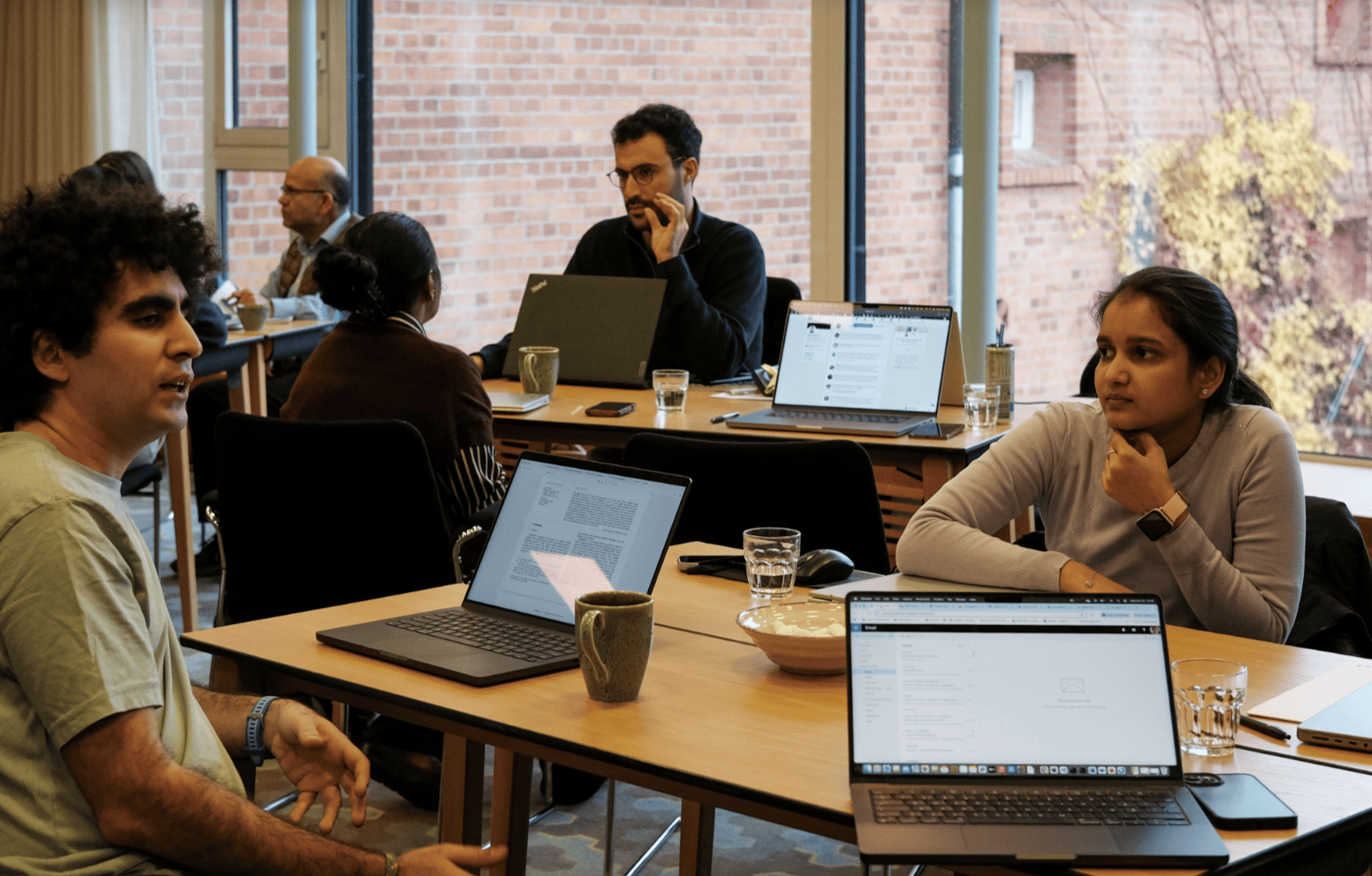 dES colleagues discussing in their division retreat in October 2025.